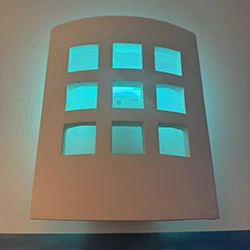 Philips Hue smart light illuminated in blue