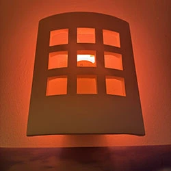 Philips Hue smart light illuminated in red